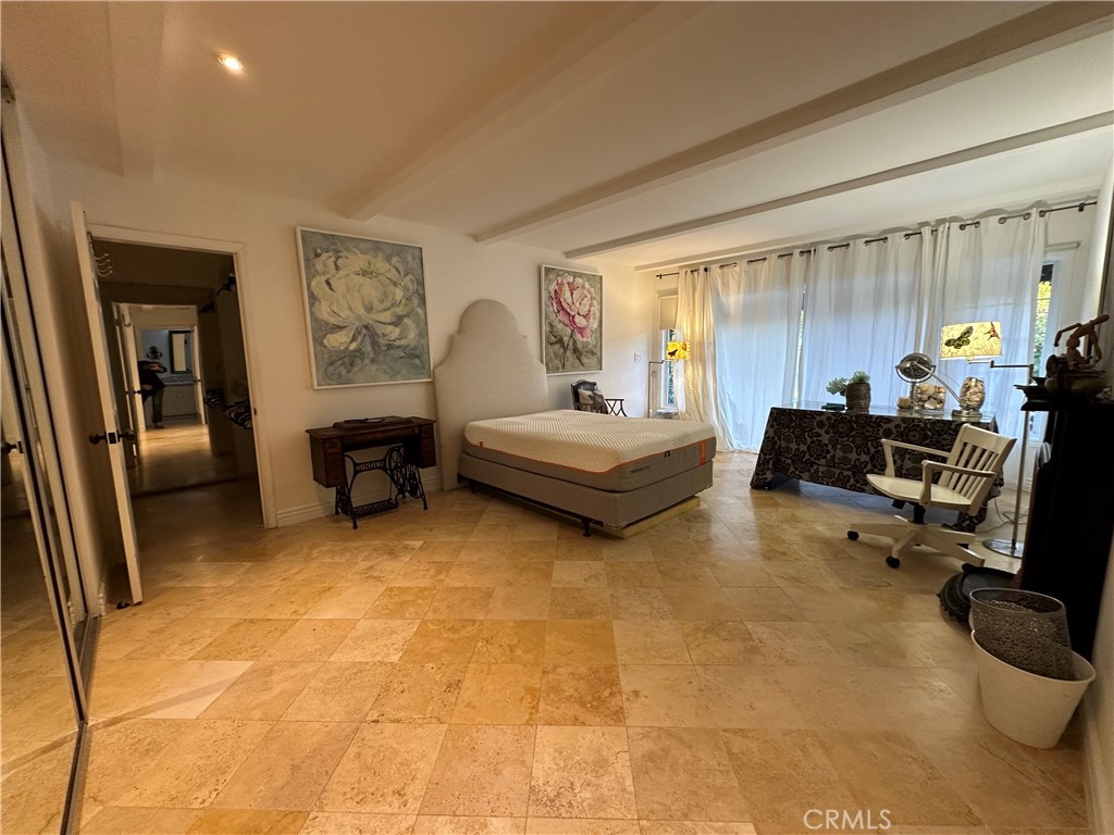 27424 Rainbow Ridge Road Palos Verdes Peninsula, CA 90274 - Photo 35 of 47 a bedroom with a bed and furniture