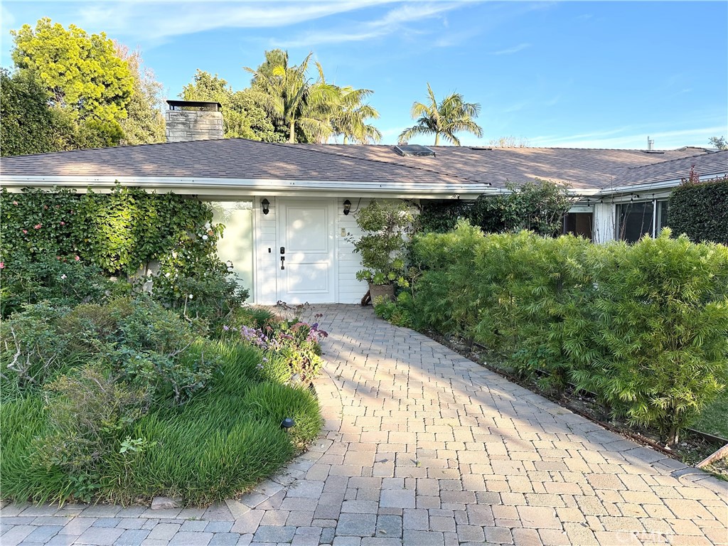 27424 Rainbow Ridge Road Palos Verdes Peninsula, CA 90274 - Photo 5 of 47 a front view of a house with a yard