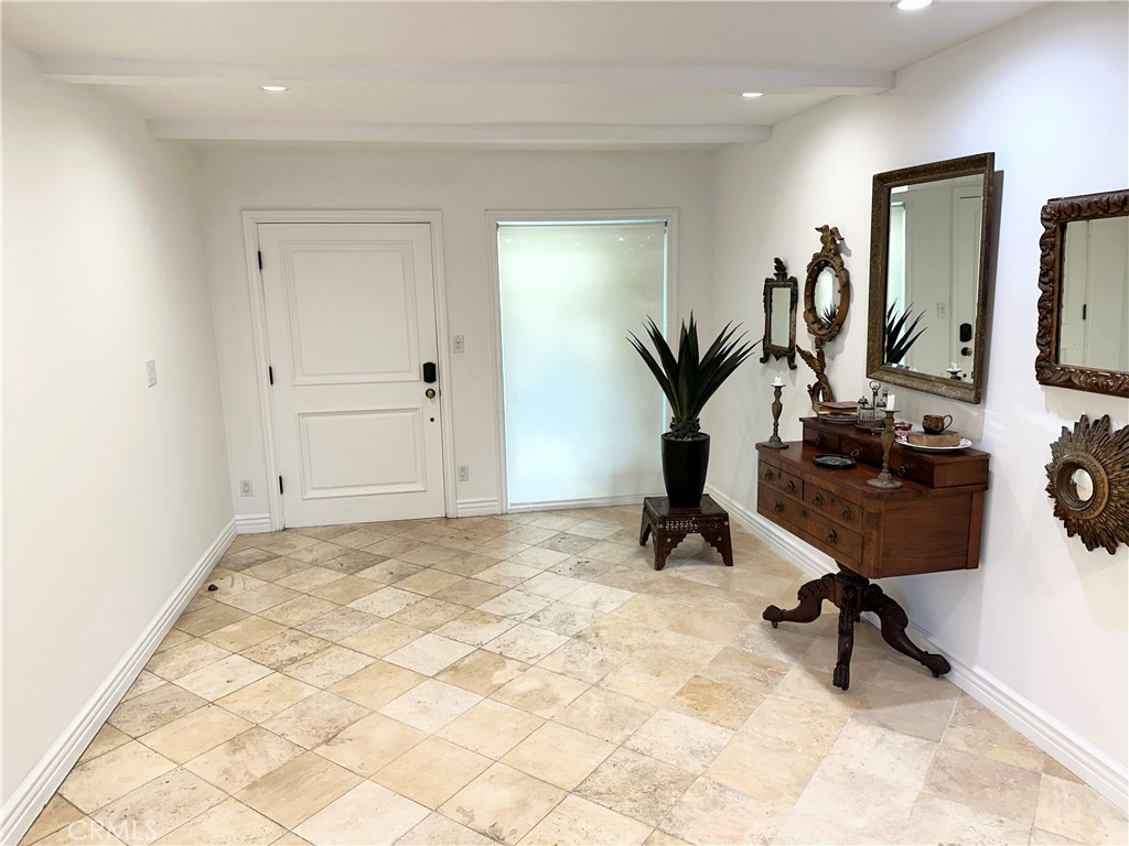 27424 Rainbow Ridge Road Palos Verdes Peninsula, CA 90274 - Photo 6 of 47 a view of a workspace with gym equipment