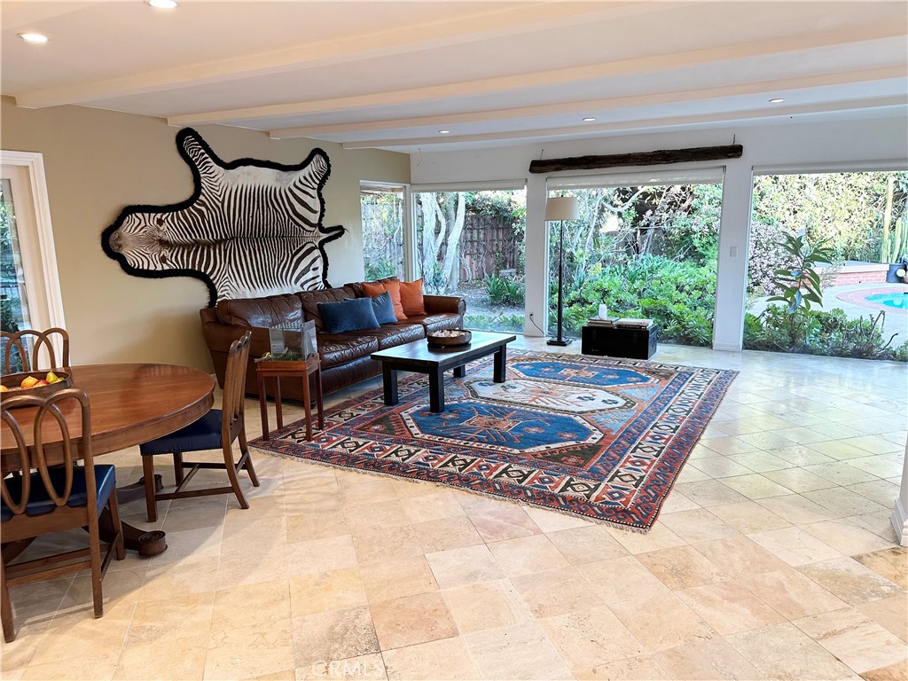 27424 Rainbow Ridge Road Palos Verdes Peninsula, CA 90274 - Photo 8 of 47 a living room with furniture and a large window