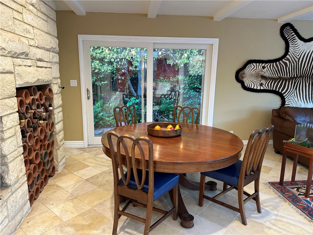 27424 Rainbow Ridge Road Palos Verdes Peninsula, CA 90274 - Photo 9 of 47 a view of a dining room with furniture window and outside view