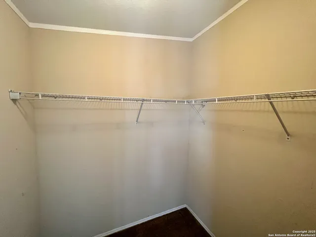 a view of a room with racks on the wall