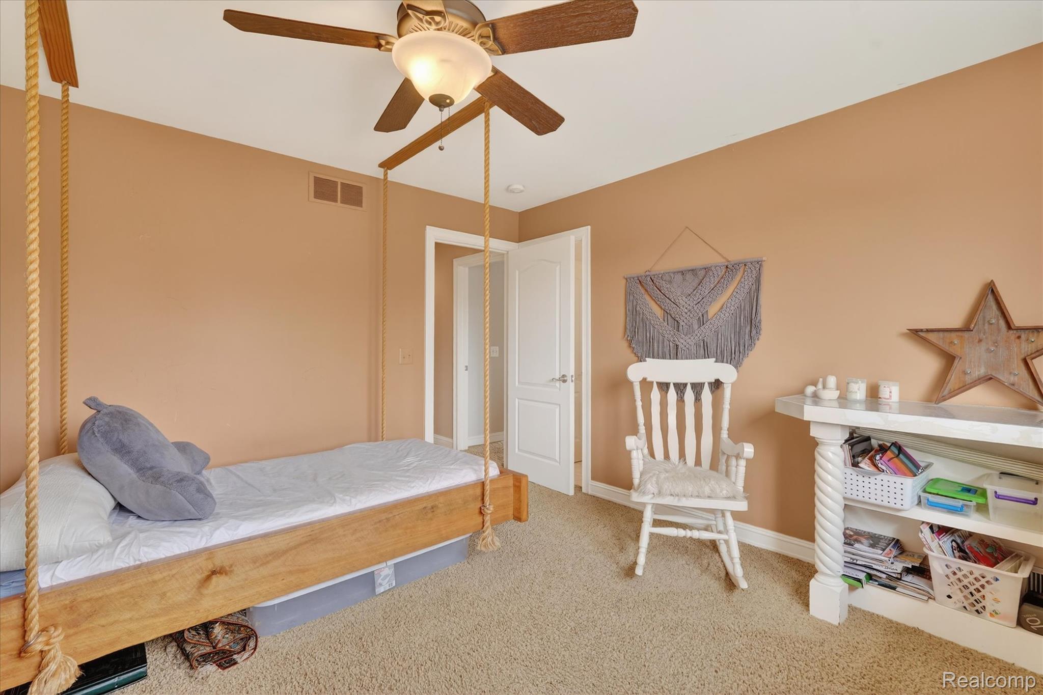 6932 Oakhurst Ridge Road Clarkston, MI 48348 - Photo 38 of 78 Carpeted bedroom with baseboards and ceiling fan
