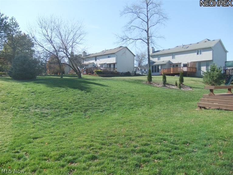 3795 Stonebridge Boulevard Akron, OH 44321 - Photo 23 of 24 And to a fabulous open backyard.
