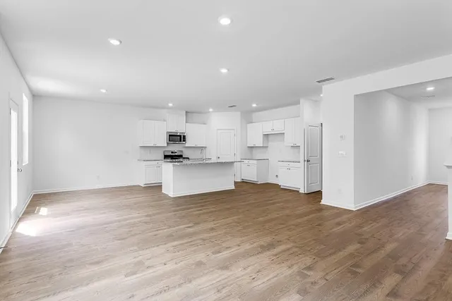 a view of kitchen with wooden floor