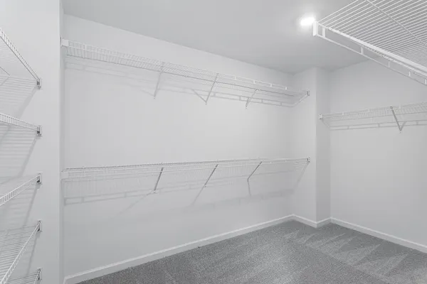 a view of a room with racks on the wall