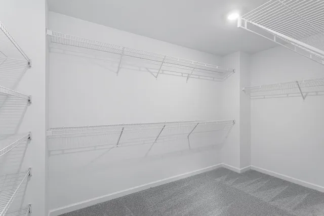 a view of a room with racks on the wall