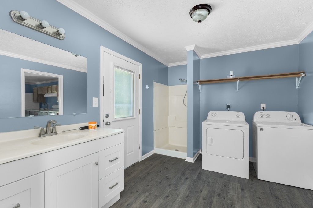 427 South Fair Street Morrison, TN 37357 - Photo 43 of 44 a bathroom with a double vanity sink and mirror