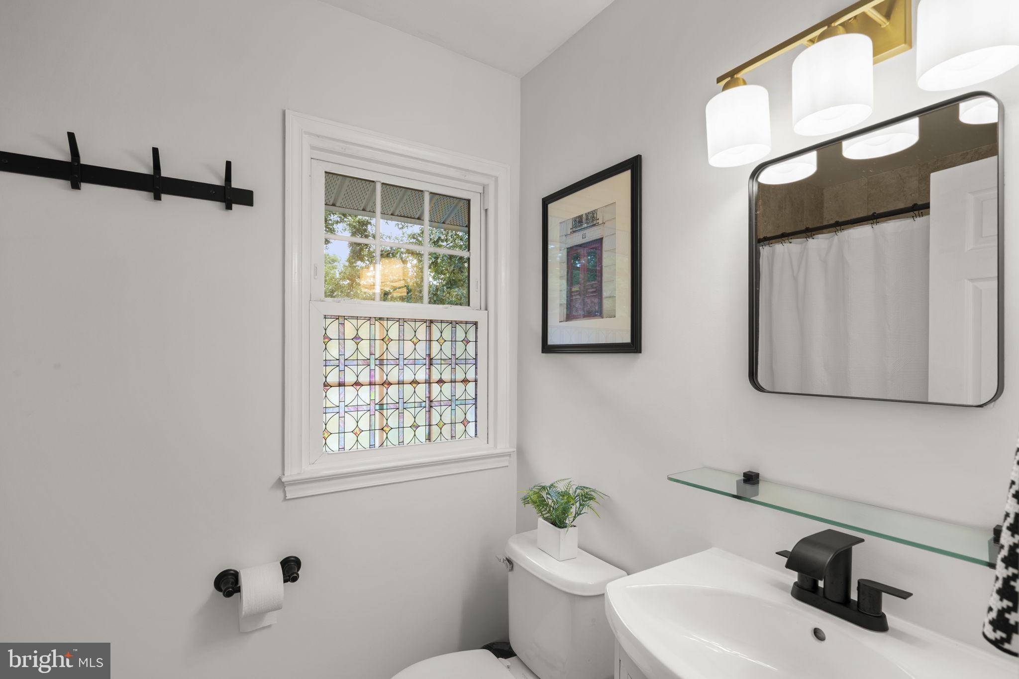 6106 Roxbury Avenue Springfield, VA 22152 - Photo 33 of 50 Hall bathroom with double sinks