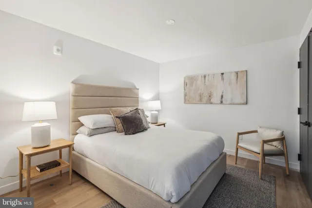 a bathroom with a shower and a sink