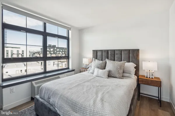a bathroom with a sink toilet tub and shower