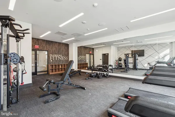 a view of a room with gym equipment