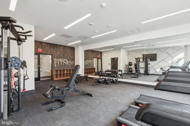 a view of a room with gym equipment