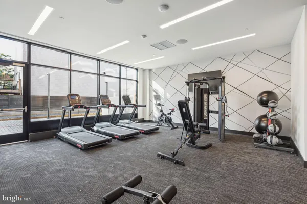 a view of a room with gym equipment