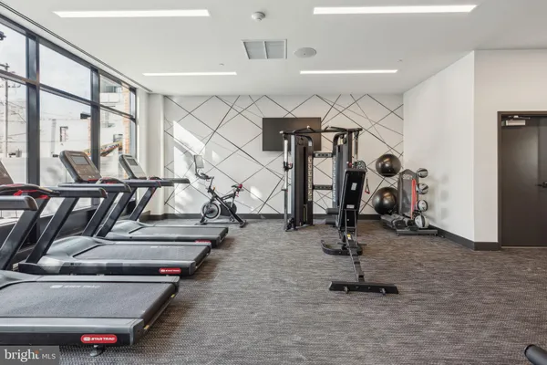 a view of a room with gym equipment