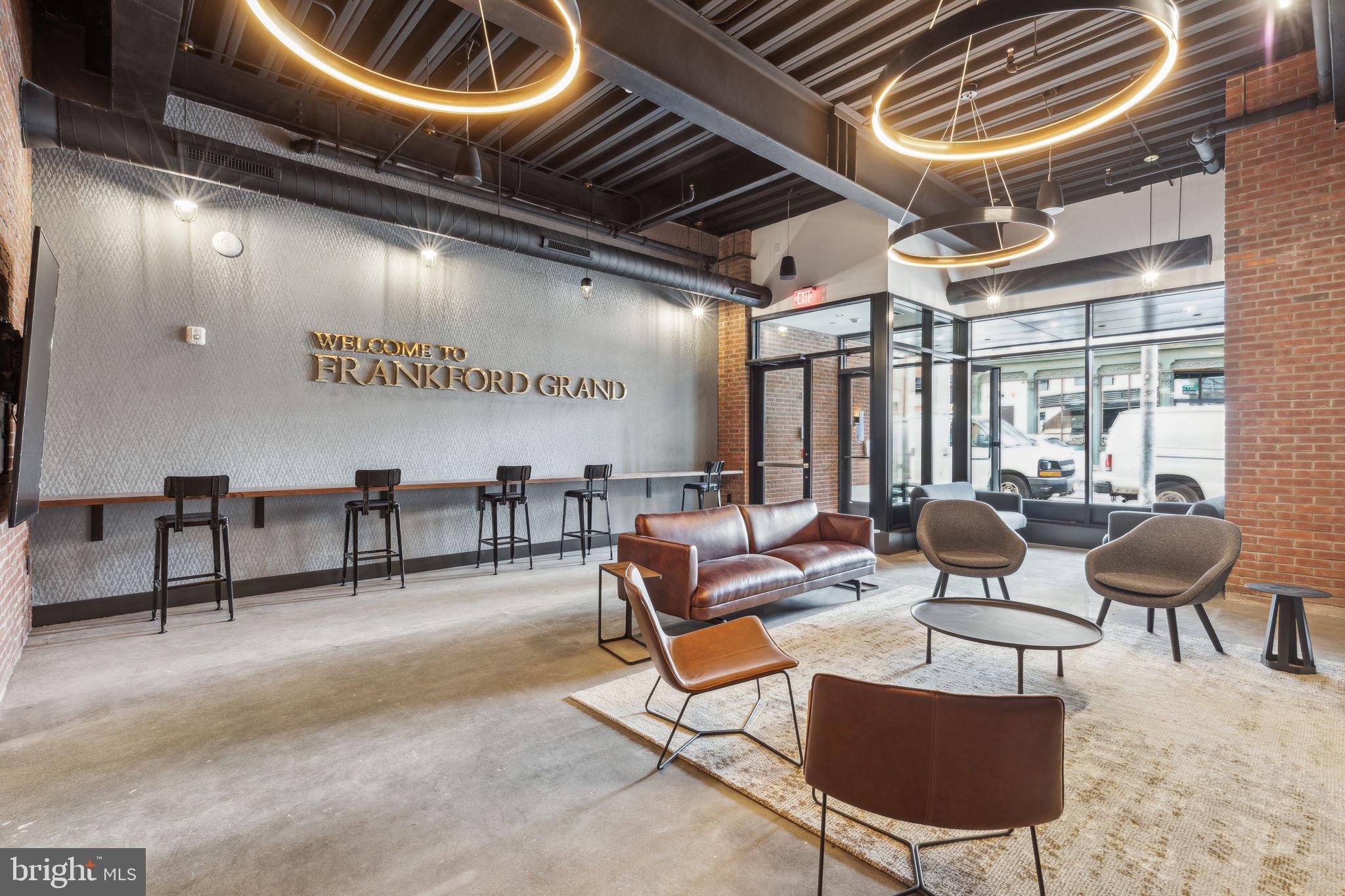 1122 Frankford Avenue, Unit STUDIO A2 Philadelphia, PA 19125 - Photo 43 of 45 a outdoor space with lots of chairs and a projector