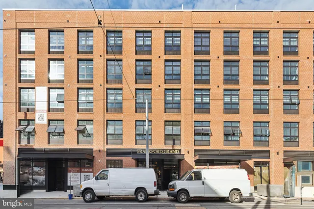 a car parked in front of a building