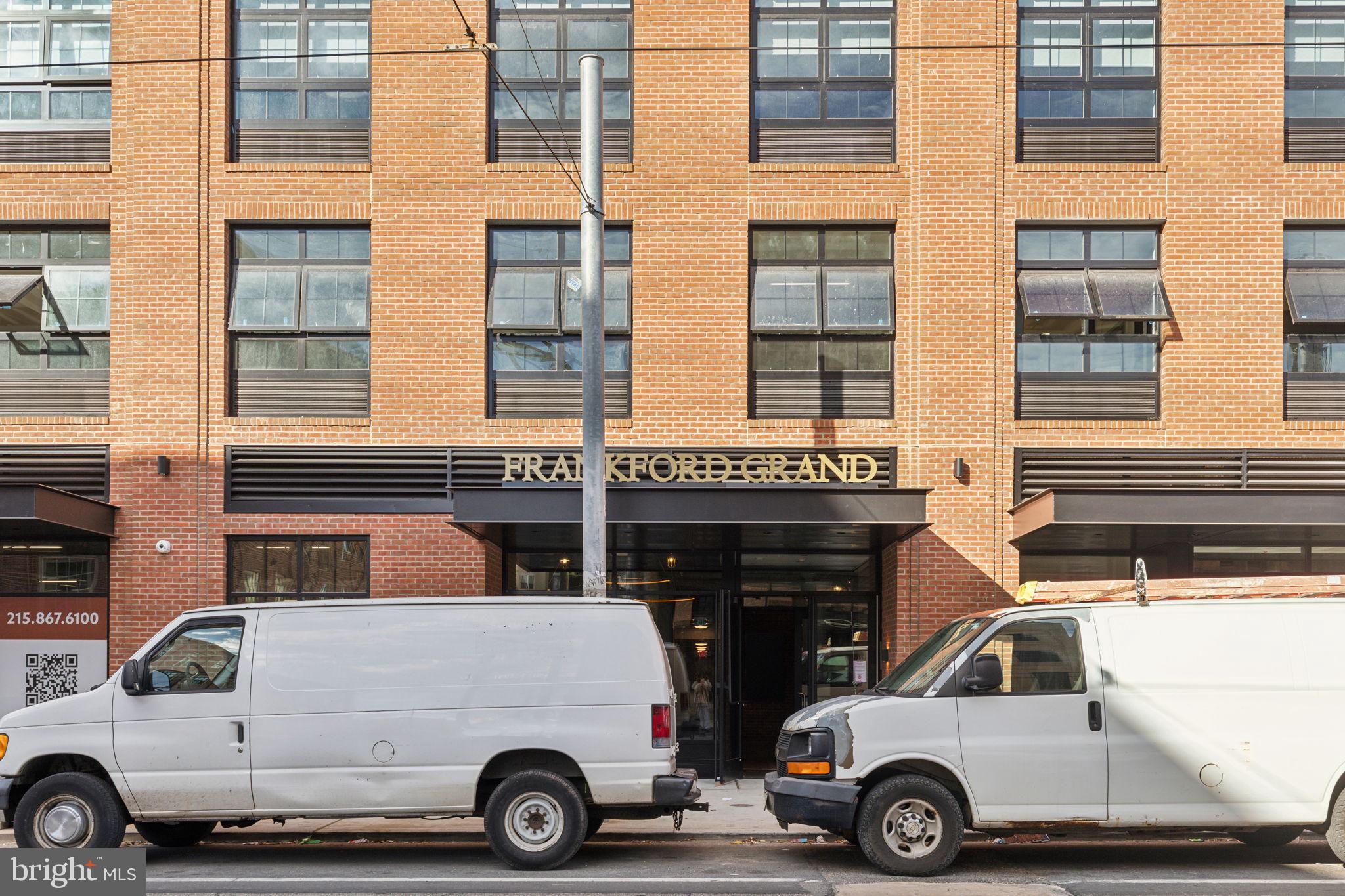 1122 Frankford Avenue, Unit STUDIO A2 Philadelphia, PA 19125 - Photo 45 of 45 a car parked in front of a building