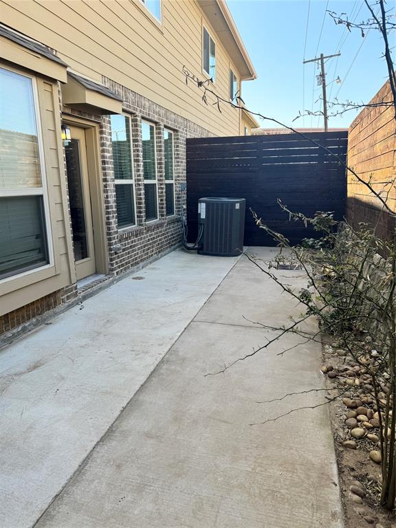 4475 Samarth Street Irving, TX 75061 - Photo 24 of 26 a view of a house with a wooden fence