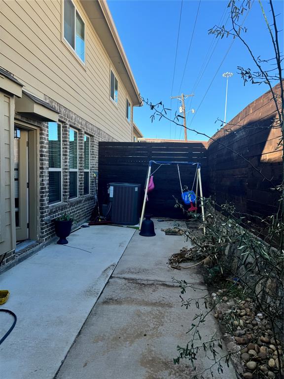 4475 Samarth Street Irving, TX 75061 - Photo 25 of 26 a view of a house with backyard and sitting area