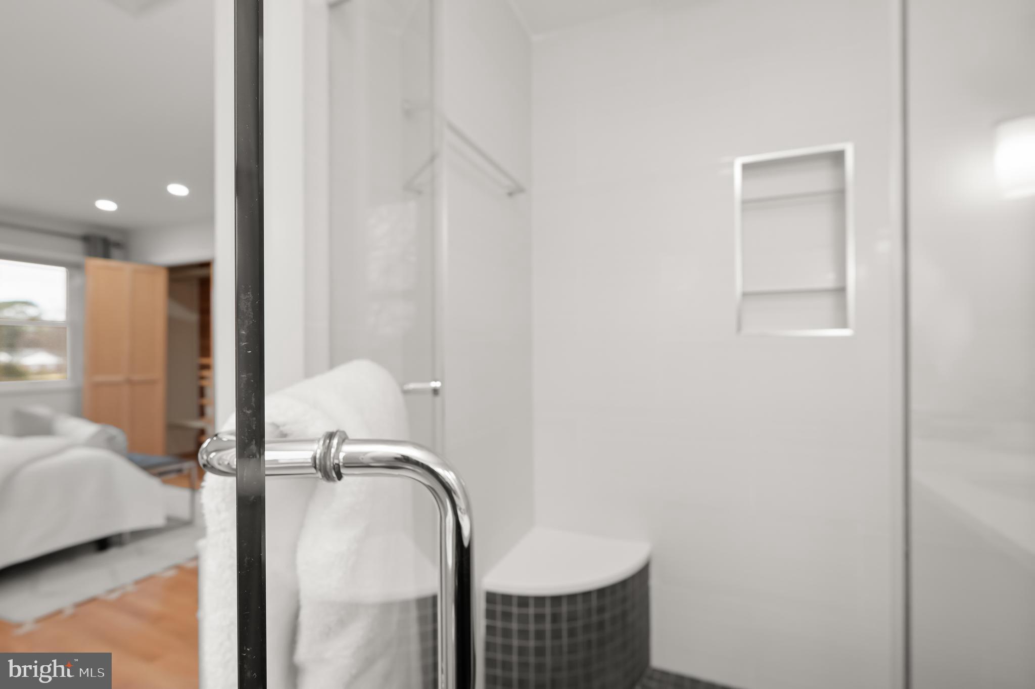 10600 Lilac Place Silver Spring, MD 20903 - Photo 26 of 43 a bathroom with a tub and shower