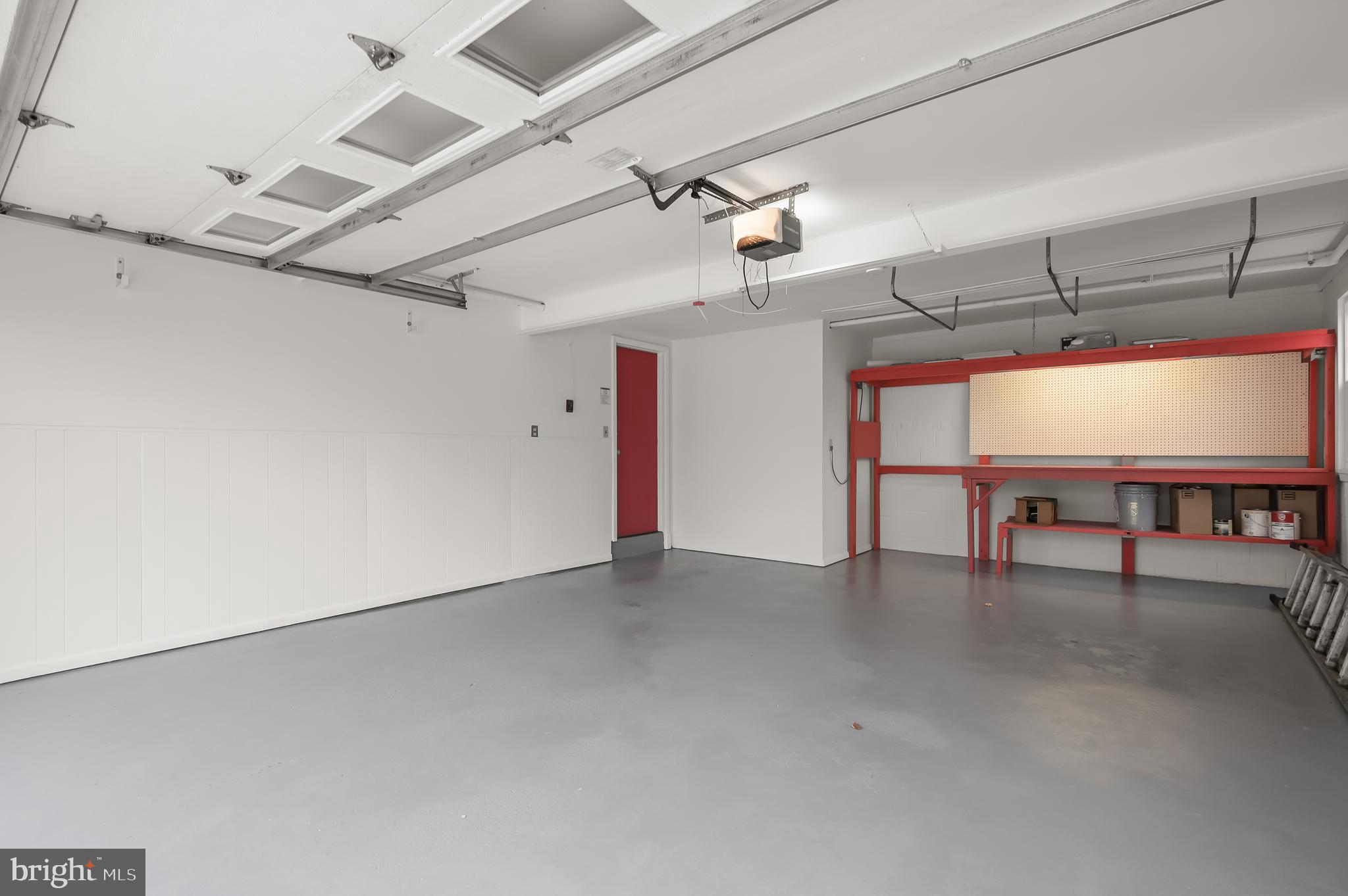 10600 Lilac Place Silver Spring, MD 20903 - Photo 38 of 43 an empty room with windows and ceiling fan