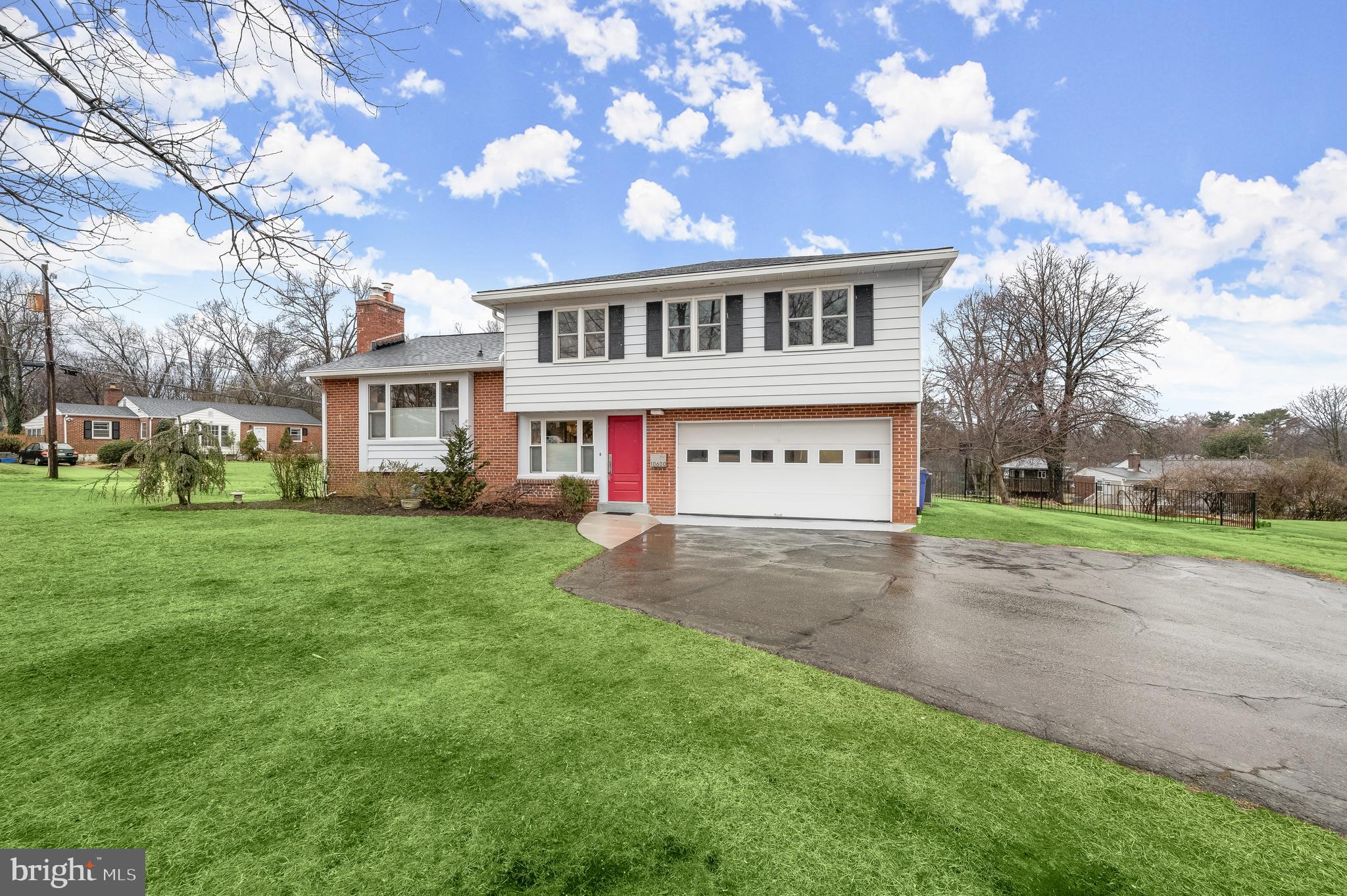 10600 Lilac Place Silver Spring, MD 20903 - Photo 43 of 43 a view of a building with a yard