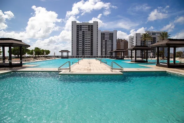a view of a playground with basketball court