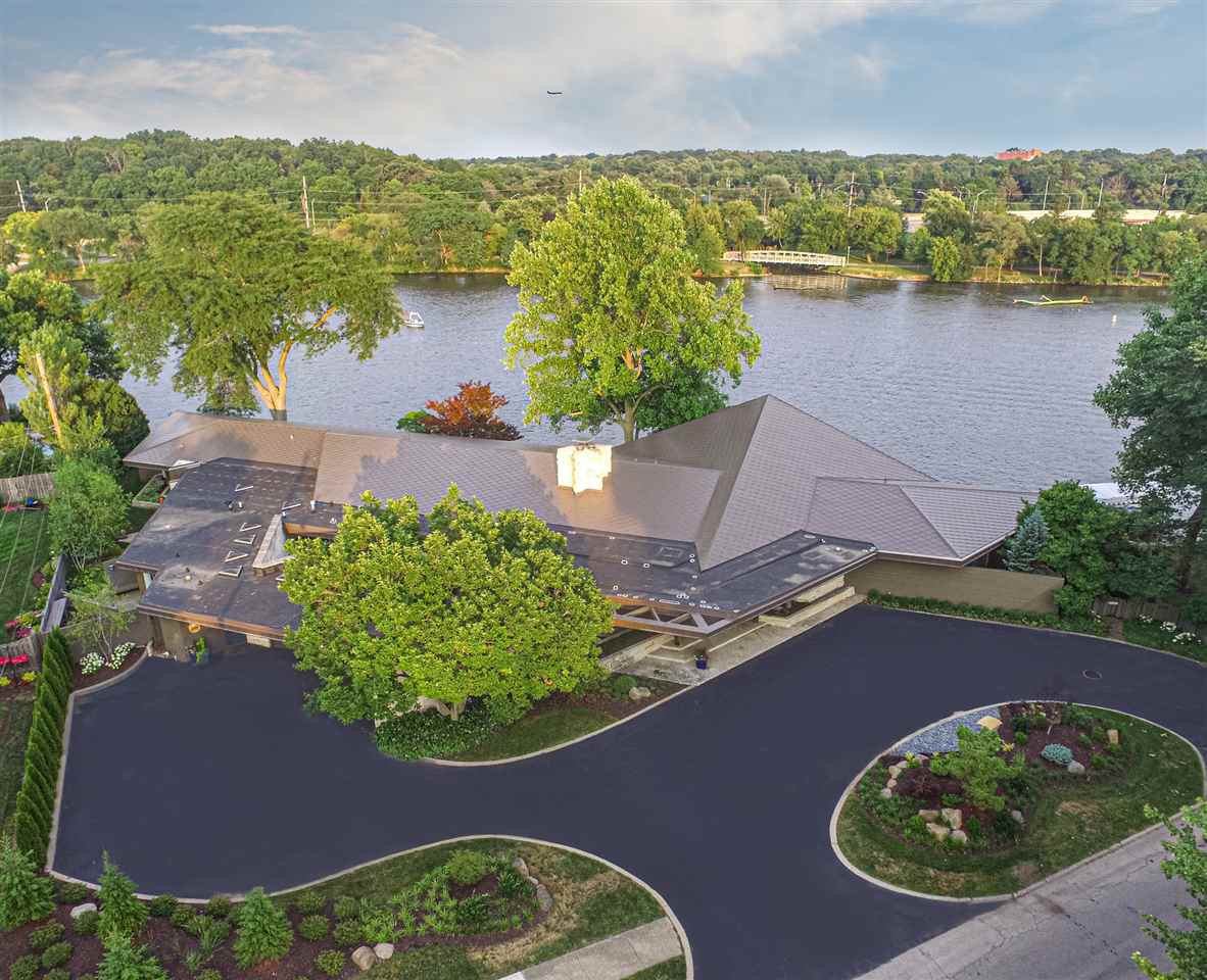 2121 Harlem Boulevard Rockford, IL 61103 - Photo 2 of 25 an aerial view of a house with a lake view