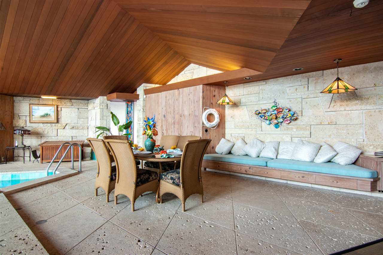 2121 Harlem Boulevard Rockford, IL 61103 - Photo 9 of 25 a dining room with furniture and a garden view