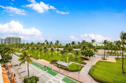 a view of a lake with a big yard