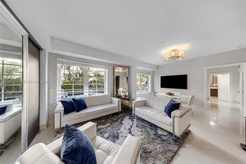 a very nice looking dining room with a table and chairs