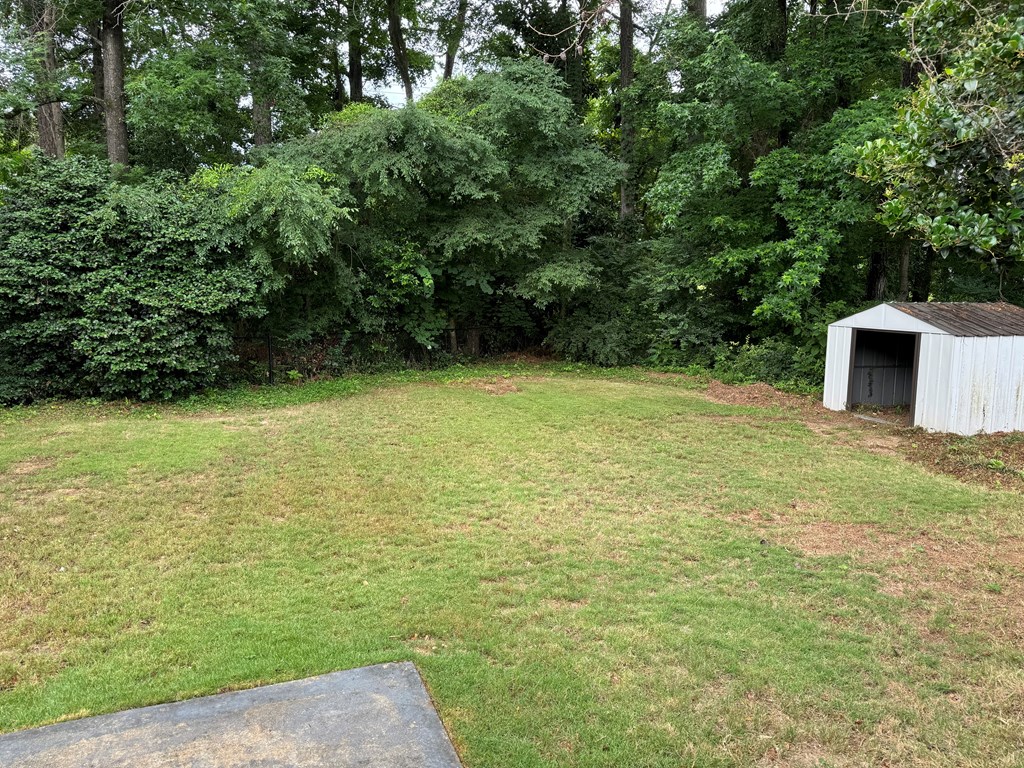 6443 Gloucester Court Columbus, GA 31909 - Photo 19 of 20 a view of a yard with an outdoor space