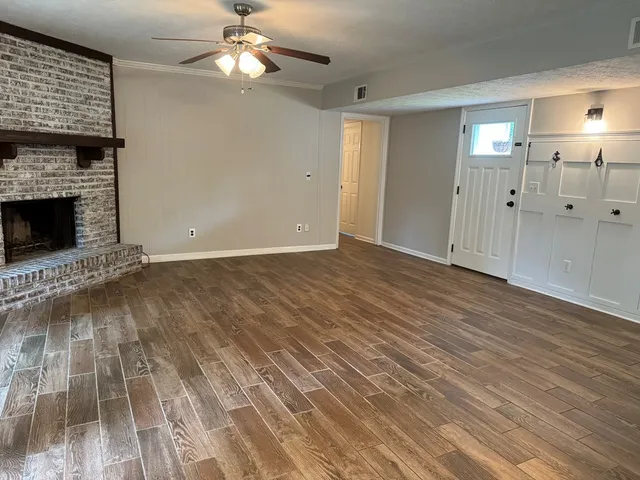 a view of a livingroom with a fireplace