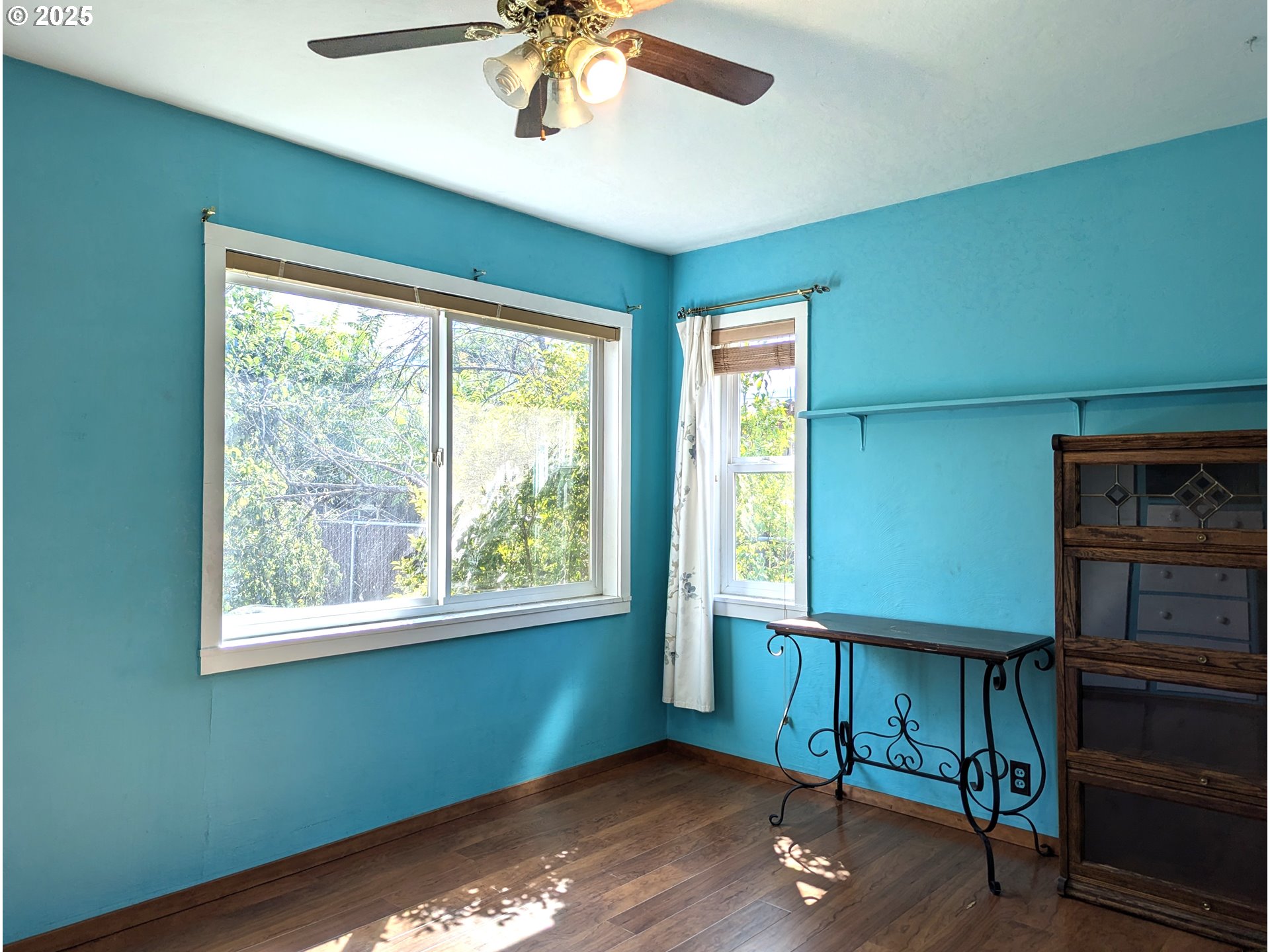 47880 West 2nd Street Oakridge, OR 97463 - Photo 29 of 36 a view of an empty room with a window and wooden floor