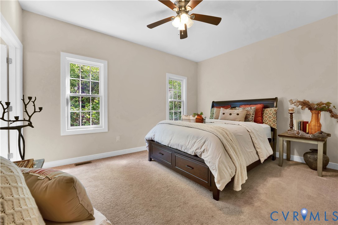 16148 Buckfast Place Beaverdam, VA 23015 - Photo 36 of 48 a spacious bedroom with a bed and window