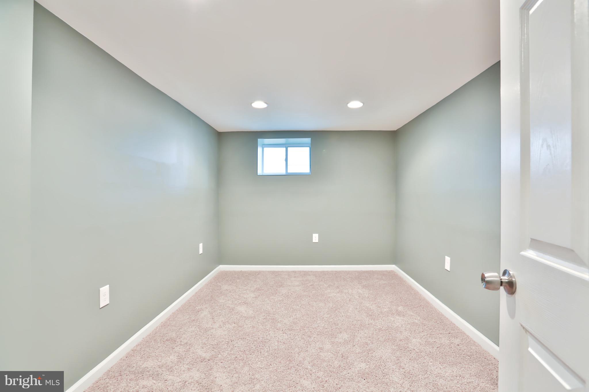 3710 Barrington Road Baltimore, MD 21215 - Photo 23 of 25 a view of a livingroom with a hallway