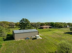 3523 East Highway 199 Springtown, TX 76082 - Photo 4 of 15 a view of a house with a yard