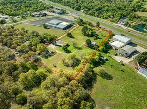 3523 East Highway 199 Springtown, TX 76082 - Photo 7 of 15 an aerial view of residential houses with outdoor space and trees