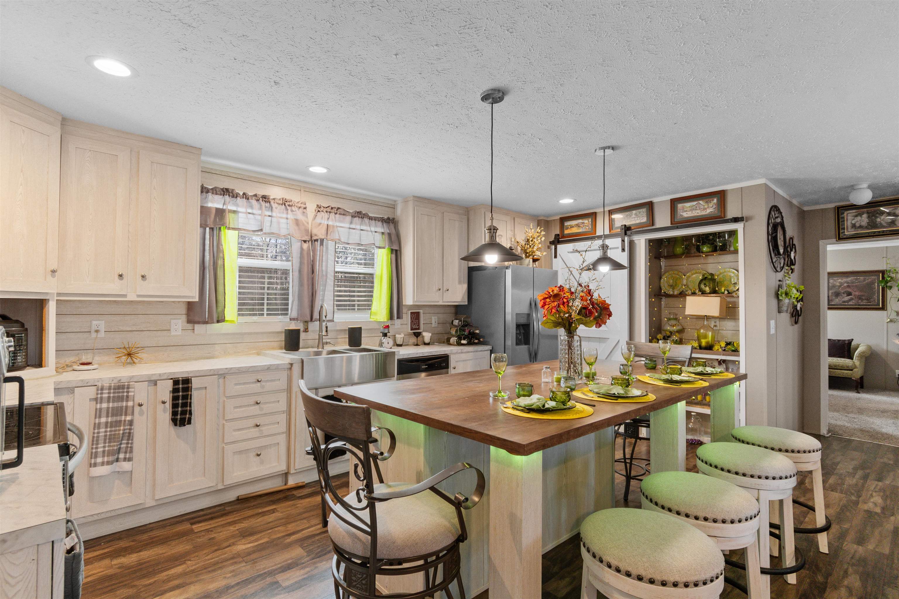 2482 Wigley Road Loris, SC 29569 - Photo 12 of 39 Living area featuring wood finished floors, recessed lighting, crown molding, and a textured ceiling