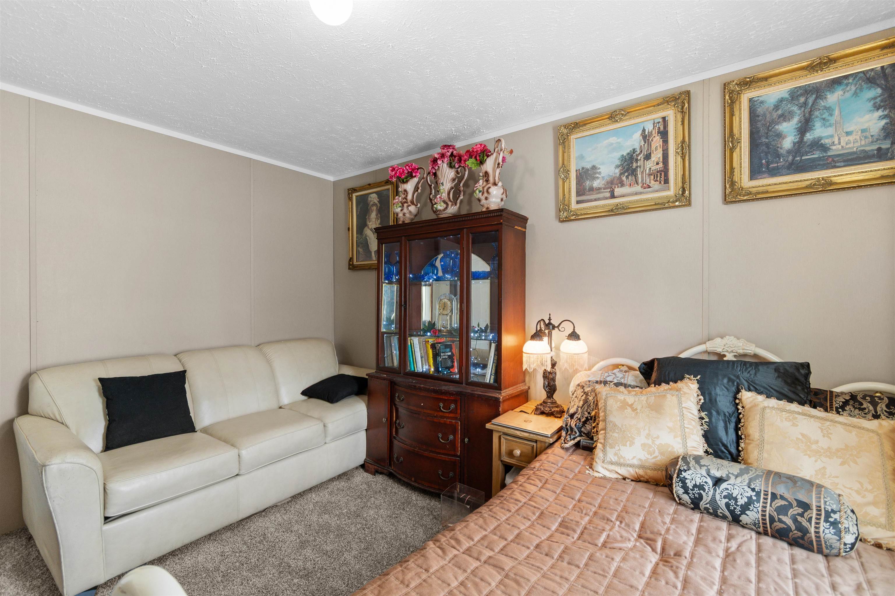 2482 Wigley Road Loris, SC 29569 - Photo 23 of 39 Carpeted bedroom featuring a textured ceiling
