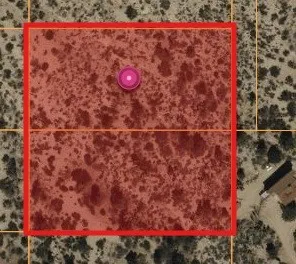 a view of a area with table and plants