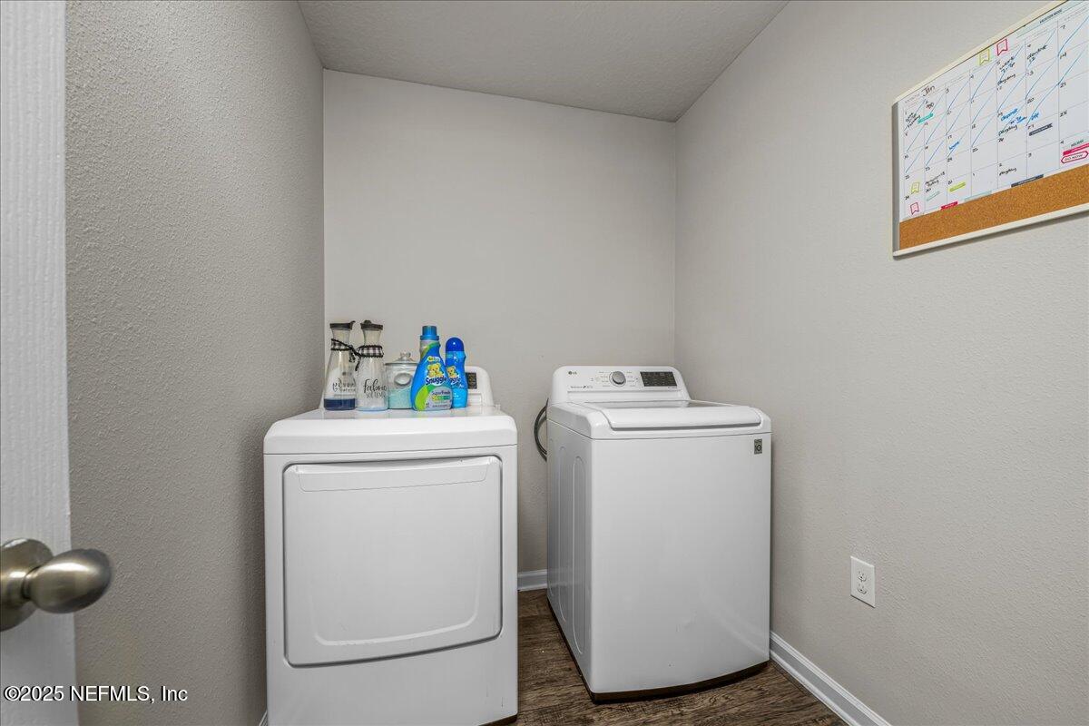 3557 Grayson Lane Middleburg, FL 32068 - Photo 13 of 18 a utility room with dryer and washer