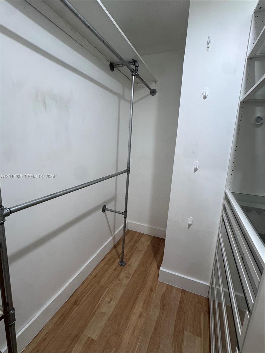 375 Southwest 32nd Road Miami, FL 33129 - Photo 31 of 44 a view of an empty walk in closet