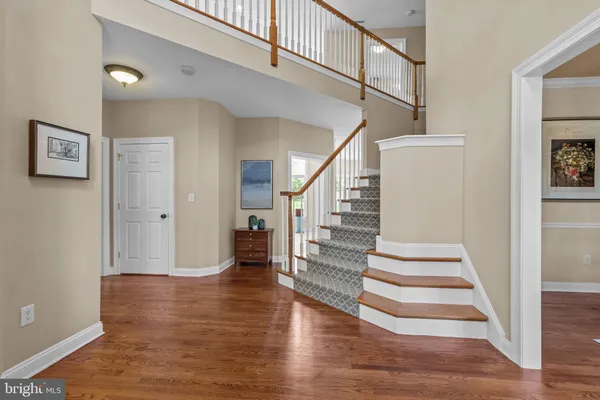 a living room with fireplace furniture and a flat screen tv