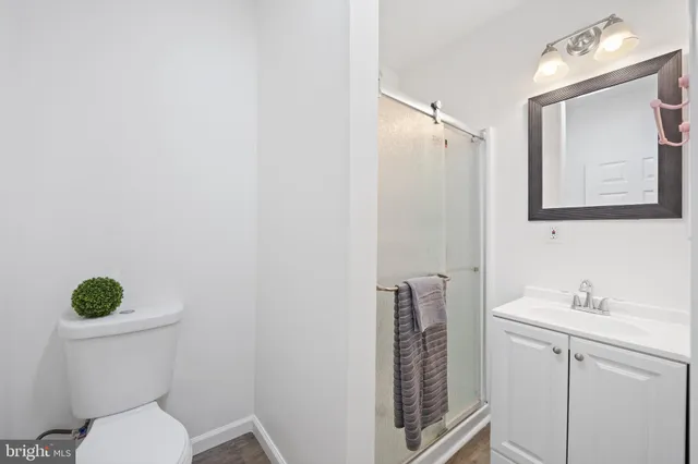 a view of a room with wooden walls