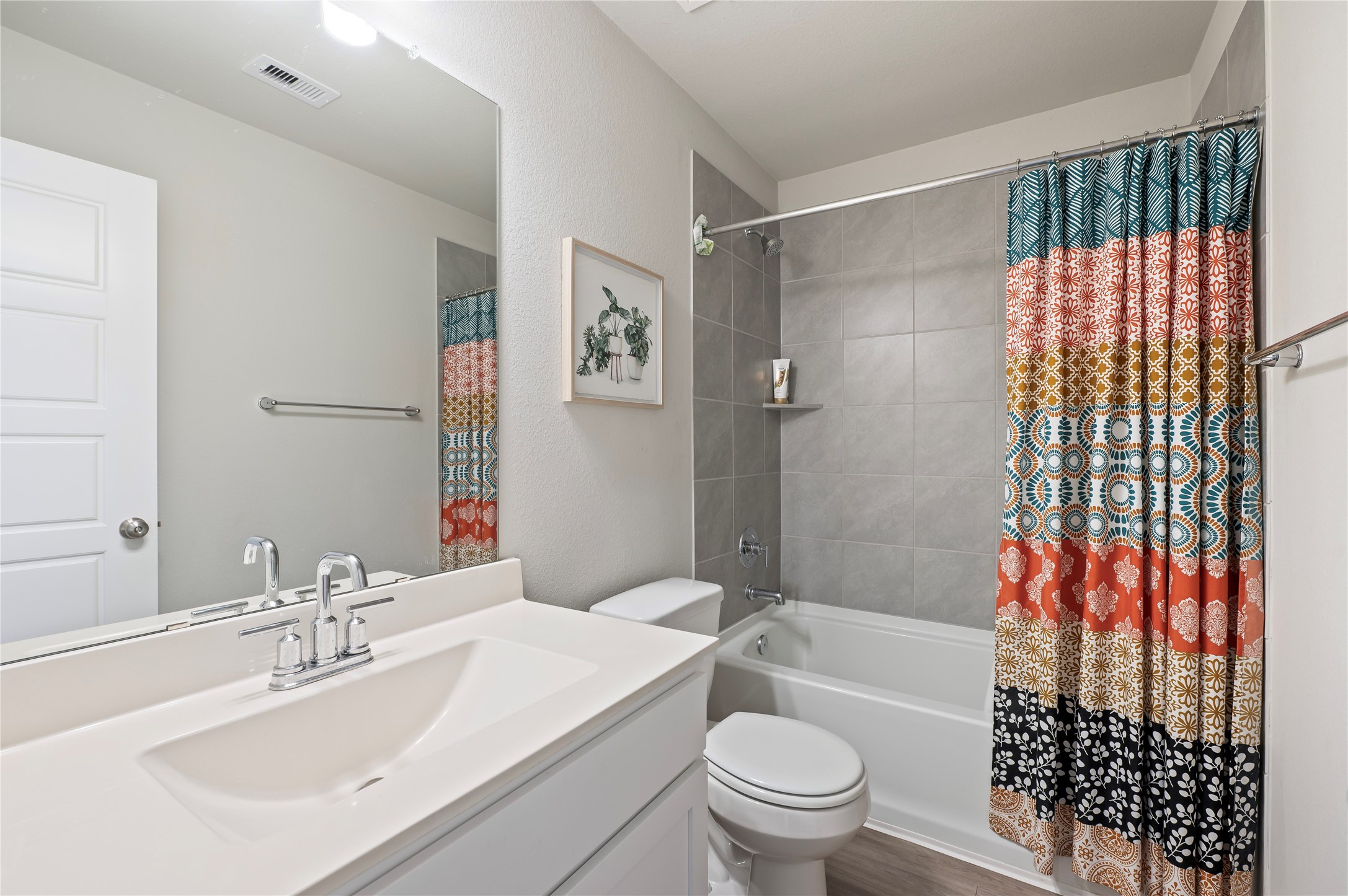 2107 Santa Ana Way Baytown, TX 77523 - Photo 18 of 40 a bathroom with a sink toilet and shower