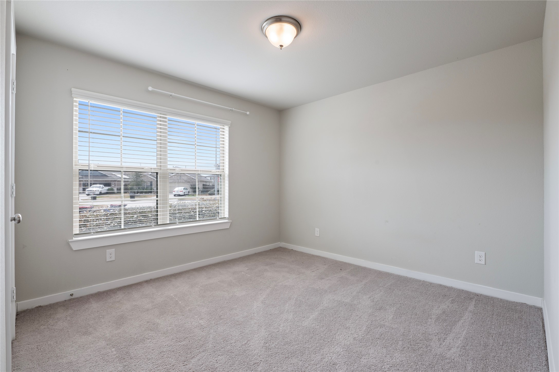 2107 Santa Ana Way Baytown, TX 77523 - Photo 20 of 40 an empty room with a window