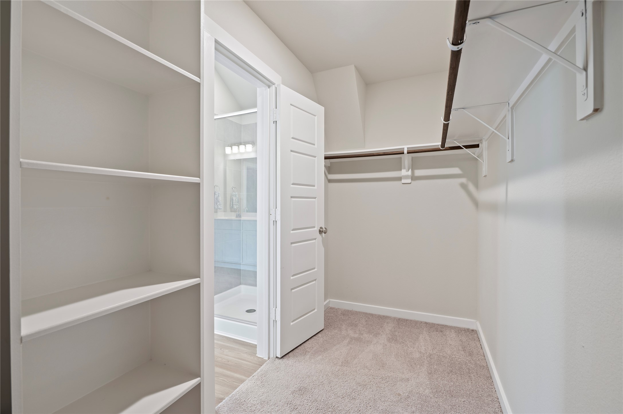 2107 Santa Ana Way Baytown, TX 77523 - Photo 21 of 40 a view of an empty walk in closet