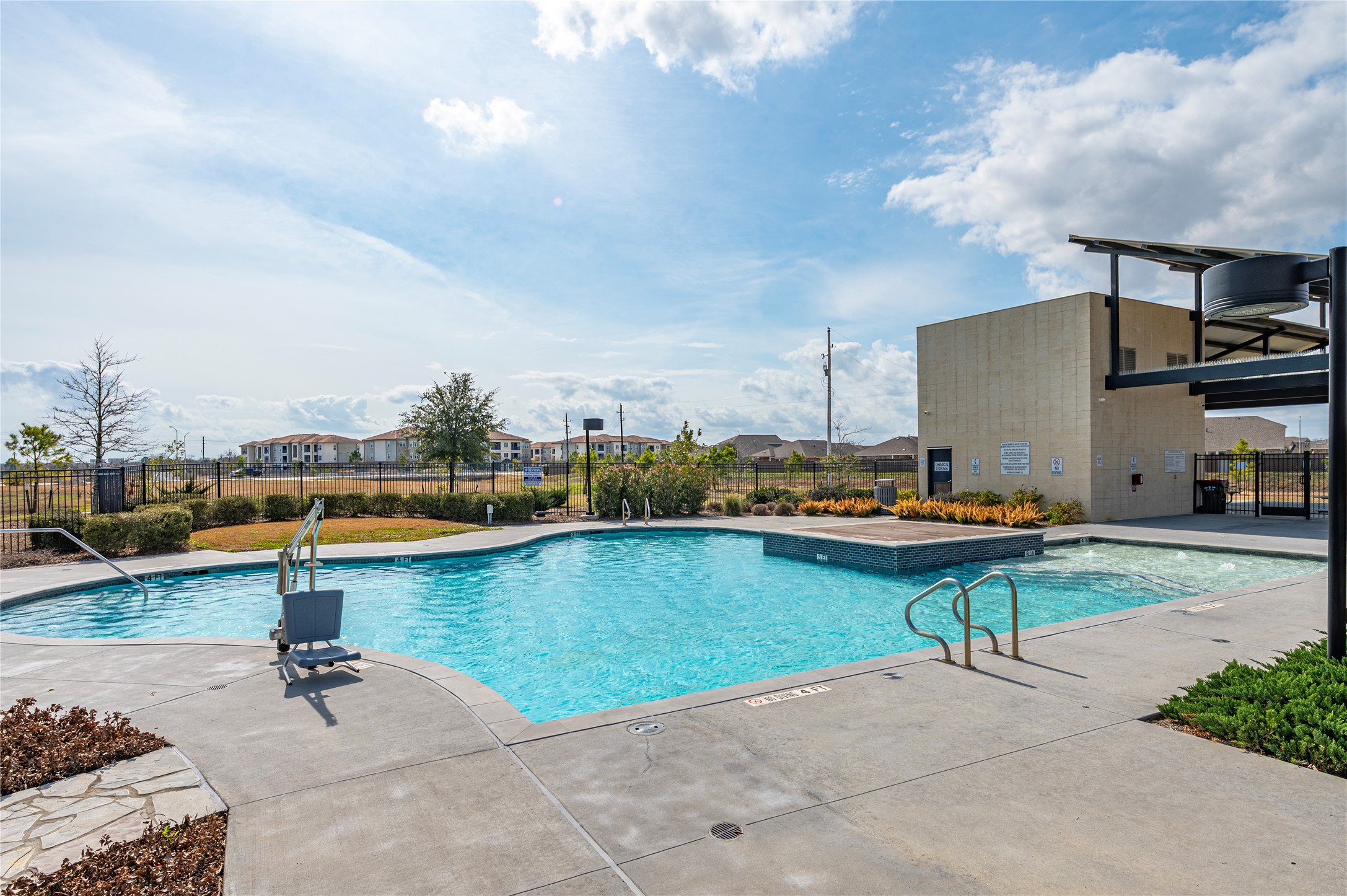 2107 Santa Ana Way Baytown, TX 77523 - Photo 37 of 40 a view of a swimming pool with lounge chairs